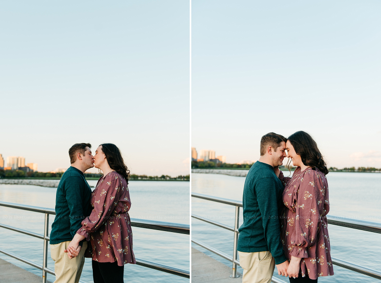a couple cuddles along the lake short during their milwaukee engagement photos